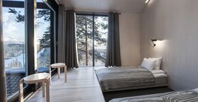 15 foto’s van een adembenemend Laplands boomhuis